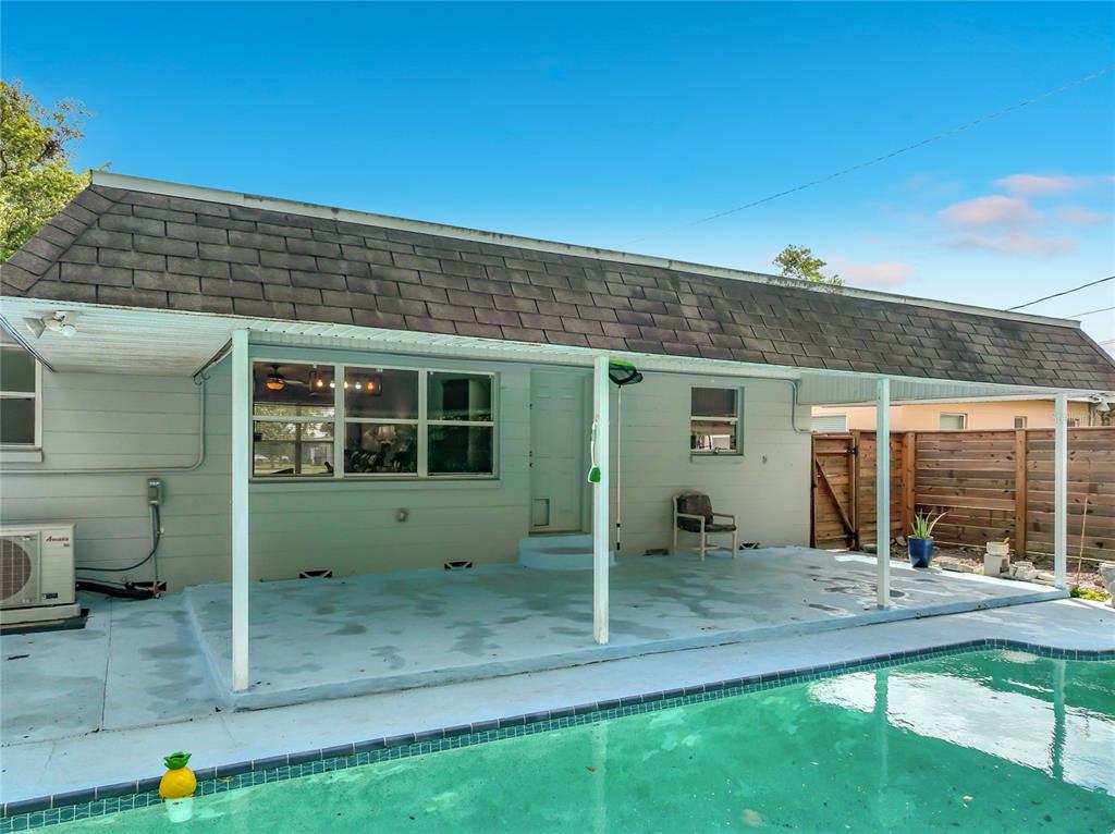 1700 Edmundshire Road Orlando, FL 32812 - Photo 37 of 43 a view of a house with backyard