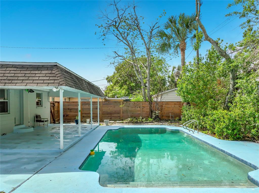 1700 Edmundshire Road Orlando, FL 32812 - Photo 38 of 43 a front view of a house with a yard