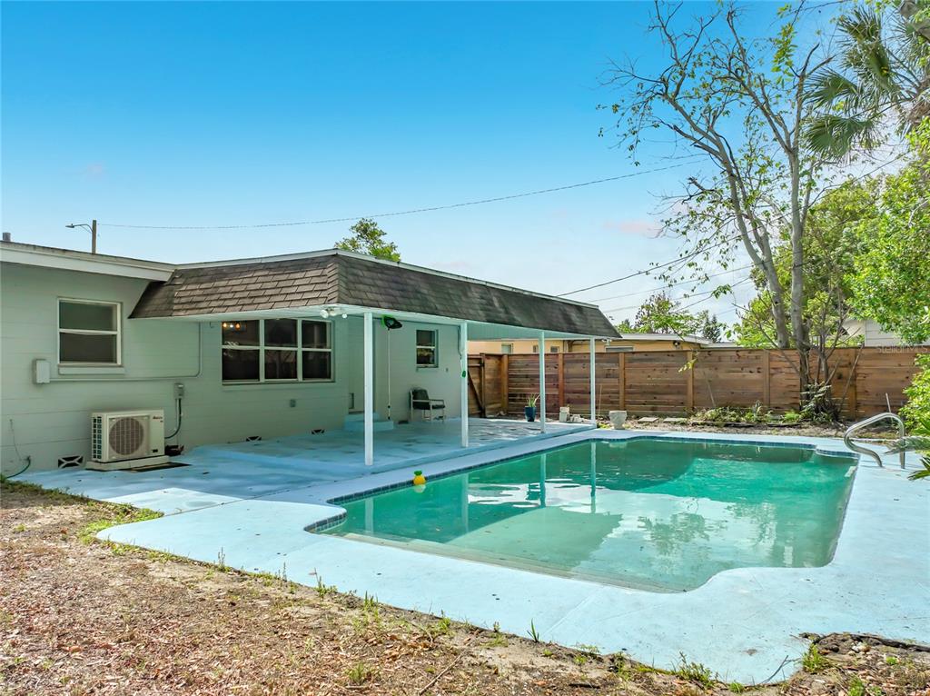 1700 Edmundshire Road Orlando, FL 32812 - Photo 39 of 43 a front view of a house with a yard