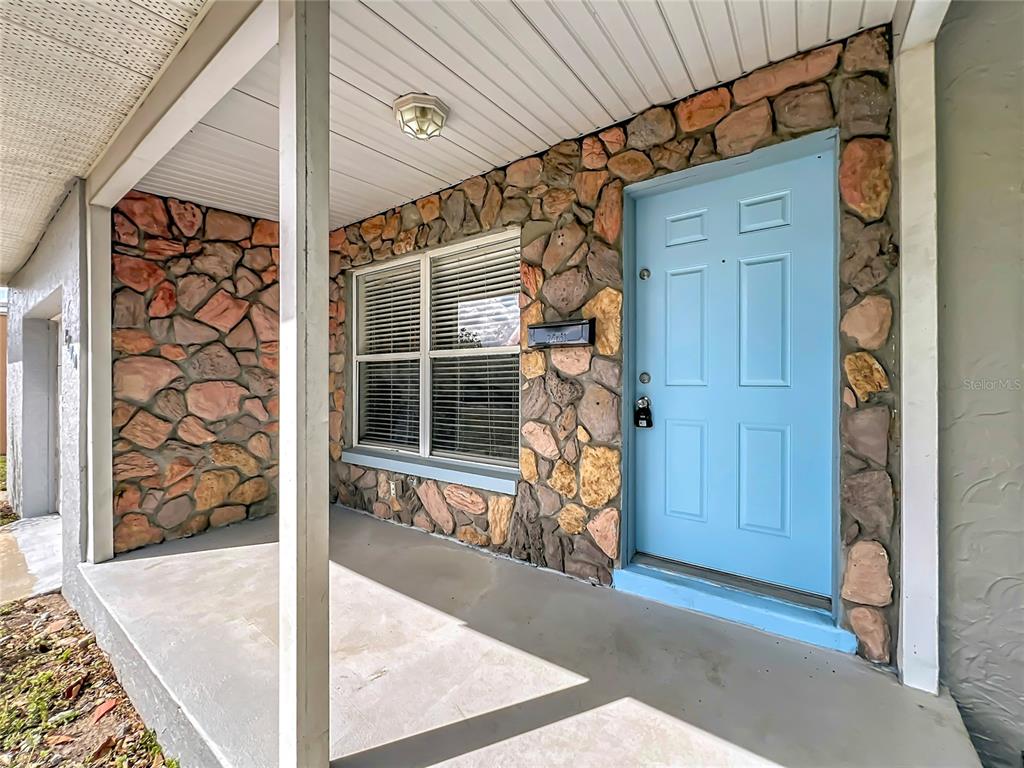 1700 Edmundshire Road Orlando, FL 32812 - Photo 5 of 43 a view of a entryway door of the house