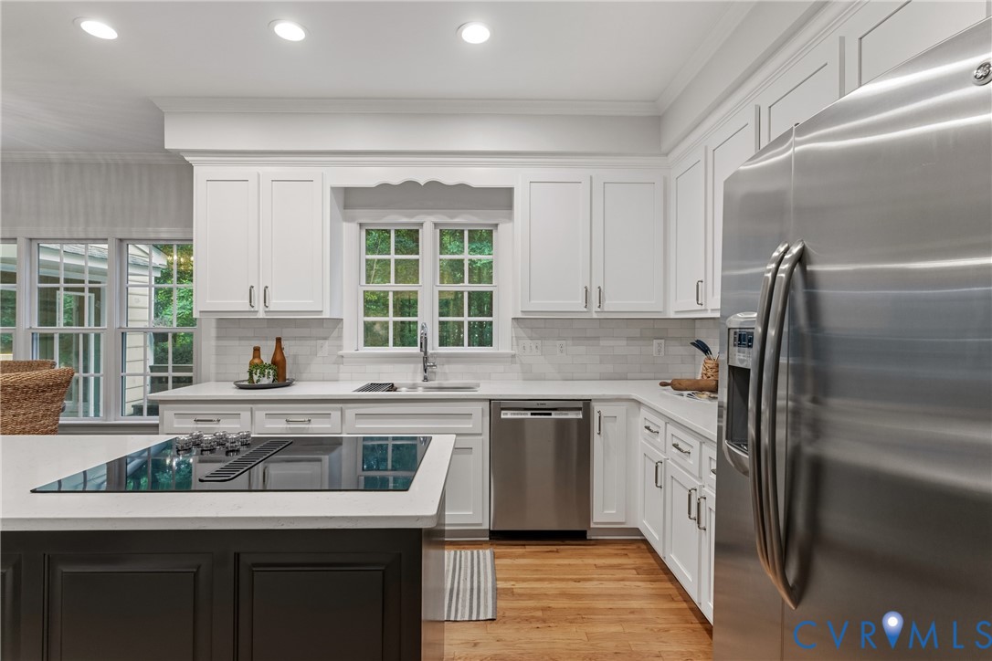 2319 Chartstone Drive Midlothian, VA 23113 - Photo 15 of 50 New cabinet doors, hardware, fixtures and quartz c