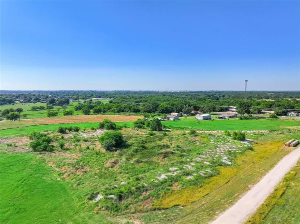 a view of a house with a big yard
