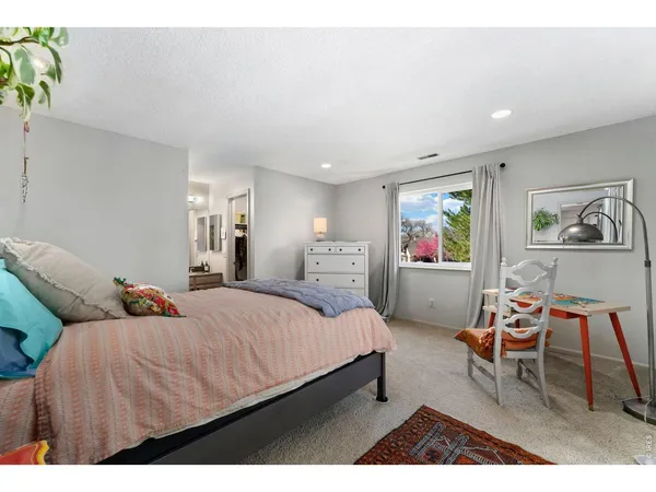 a bedroom with a bed and furniture