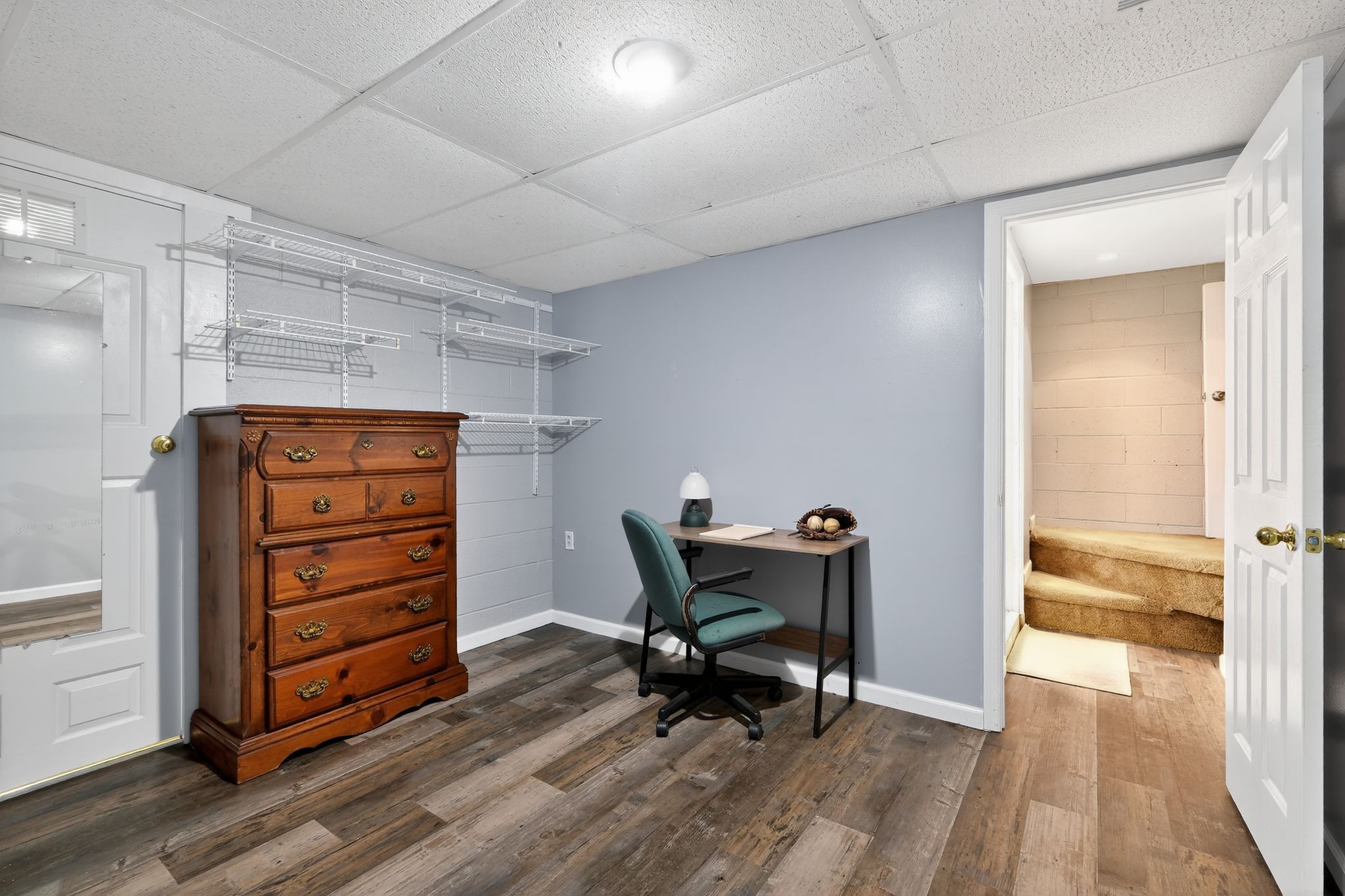 3119 Tyree Springs Road Hendersonville, TN 37075 - Photo 19 of 61 a view of a workspace with furniture and wooden floor
