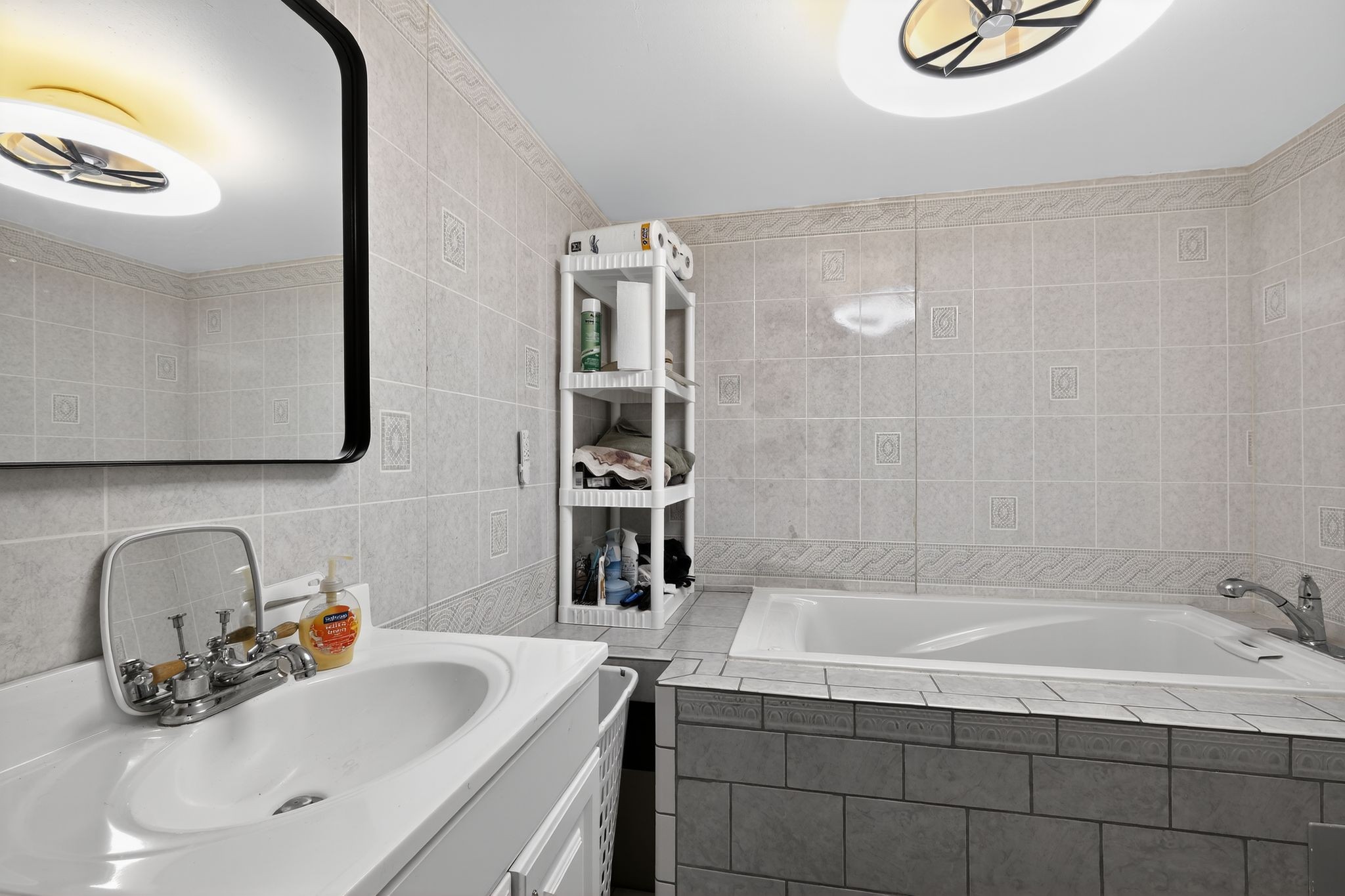 3119 Tyree Springs Road Hendersonville, TN 37075 - Photo 20 of 61 a bathroom with a sink and a mirror