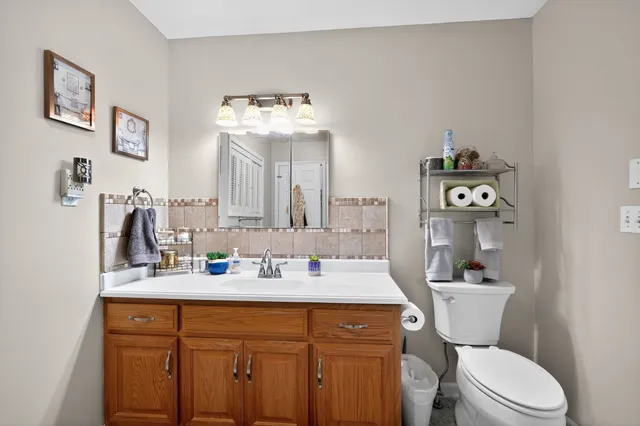 a kitchen with stainless steel appliances a stove and a refrigerator