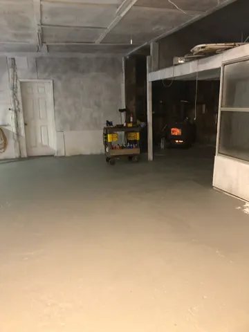 a view of a park with large trees