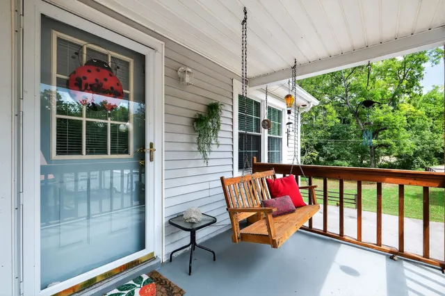 a view of a two chairs with an outdoor view