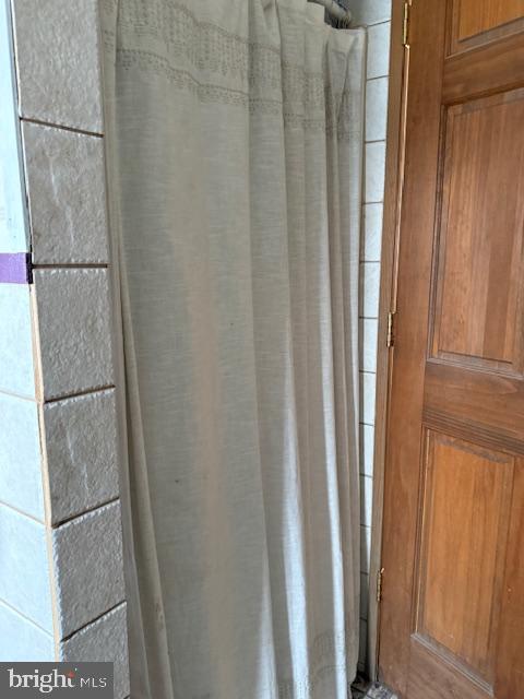 2115 Potts Hill Road Etters, PA 17319 - Photo 17 of 41 Serene shower nook with wooden accents.