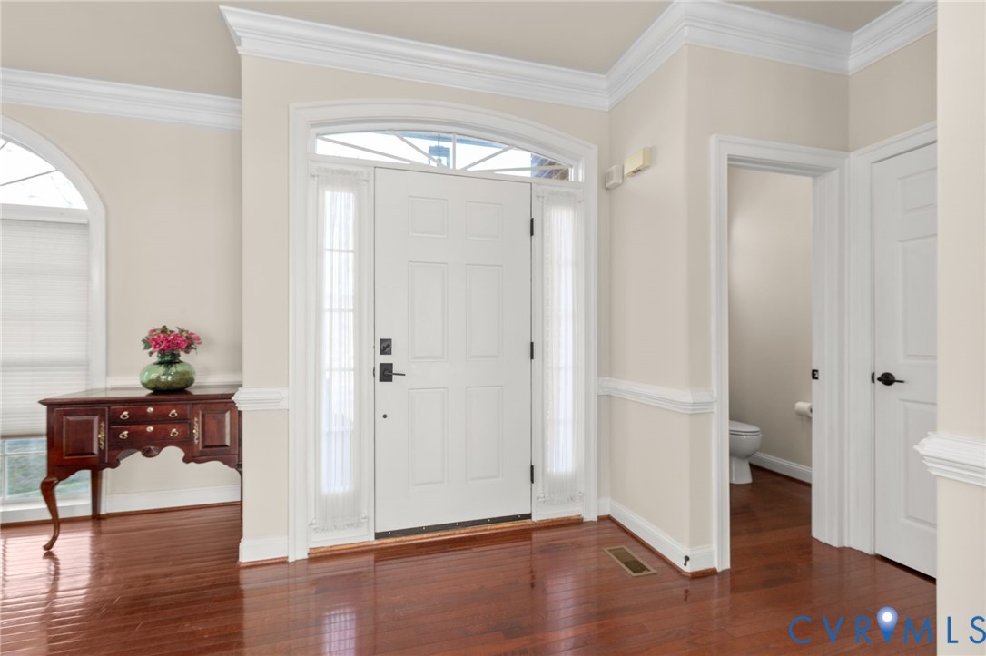 175 Shellfield Lane Colonial Beach, VA 22443 - Photo 16 of 100 a view of a room with wooden floor and dining room