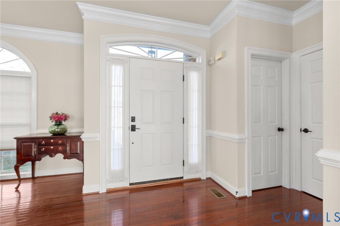 175 Shellfield Lane Colonial Beach, VA 22443 - Photo 17 of 100 Entryway featuring crown molding and dark wood-sty
