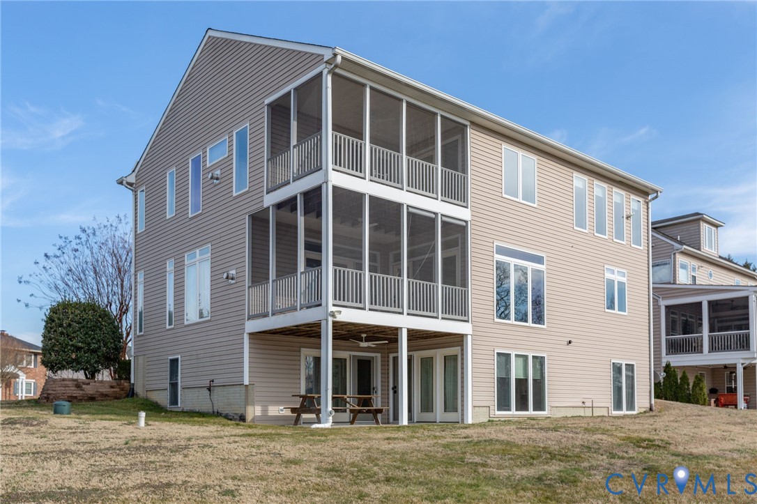 175 Shellfield Lane Colonial Beach, VA 22443 - Photo 2 of 100 a front view of a house with a yard