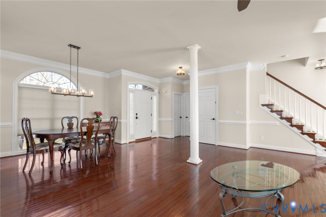 175 Shellfield Lane Colonial Beach, VA 22443 - Photo 23 of 100 a dining room with furniture a chandelier and wooden floor