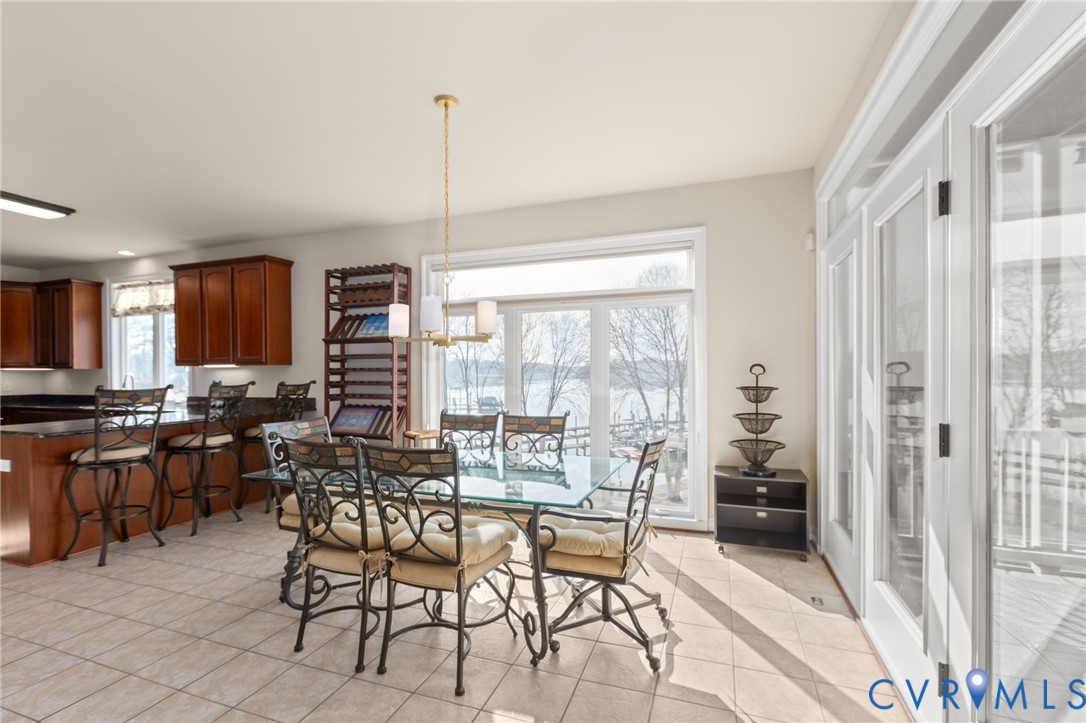 175 Shellfield Lane Colonial Beach, VA 22443 - Photo 24 of 100 a view of a dining room with furniture window and outside view