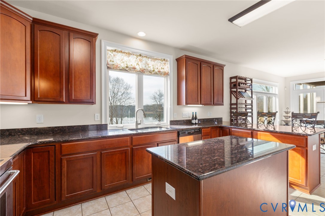 175 Shellfield Lane Colonial Beach, VA 22443 - Photo 32 of 100 Kitchen featuring dark stone countertops, stainles