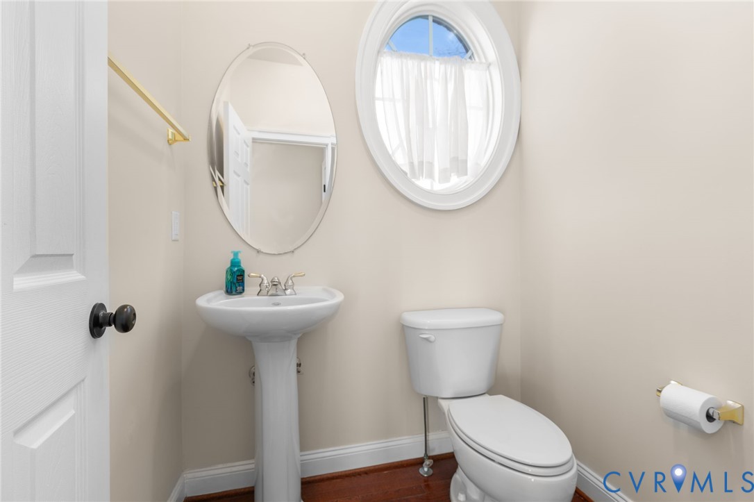 175 Shellfield Lane Colonial Beach, VA 22443 - Photo 33 of 100 a bathroom with a toilet a sink and a mirror