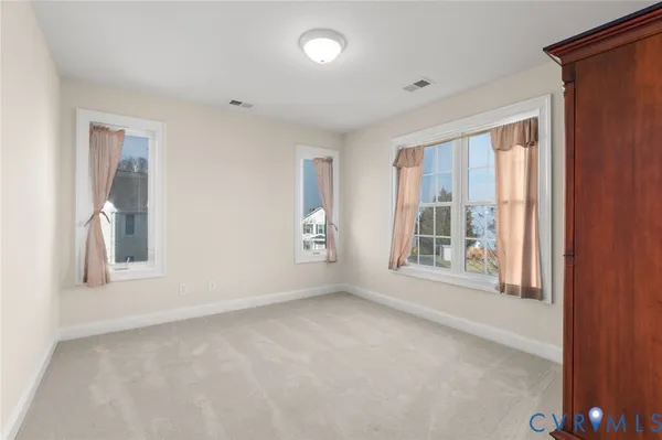 a view of a lake with a house