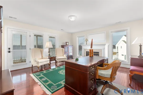 a lake view with large trees