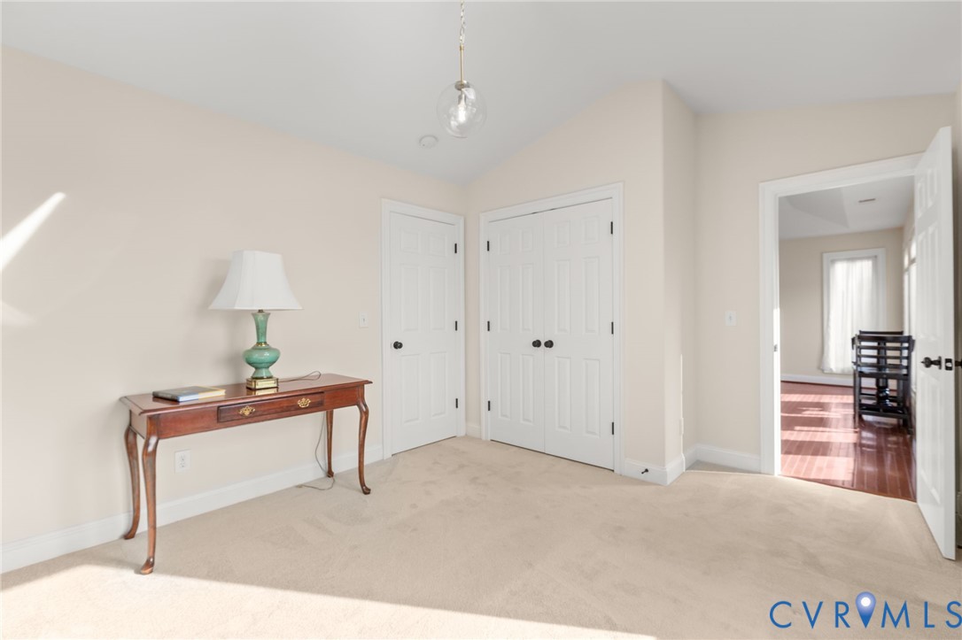 175 Shellfield Lane Colonial Beach, VA 22443 - Photo 45 of 100 Foyer with light carpet and vaulted ceiling