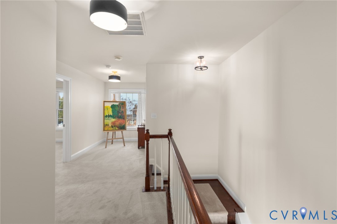175 Shellfield Lane Colonial Beach, VA 22443 - Photo 56 of 100 Hallway featuring an upstairs landing and light co