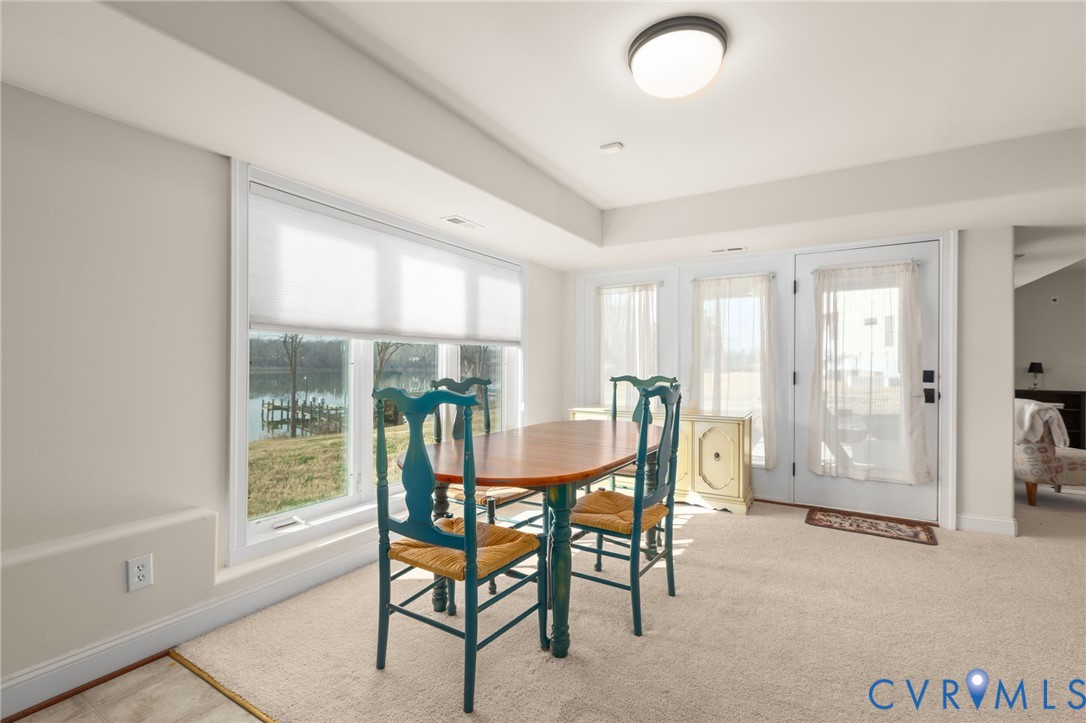 175 Shellfield Lane Colonial Beach, VA 22443 - Photo 61 of 100 a dining room with furniture and window