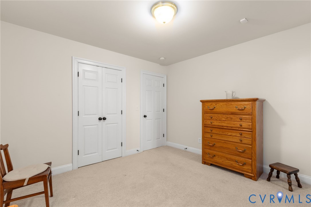 175 Shellfield Lane Colonial Beach, VA 22443 - Photo 66 of 100 Bedroom featuring light carpet and a closet