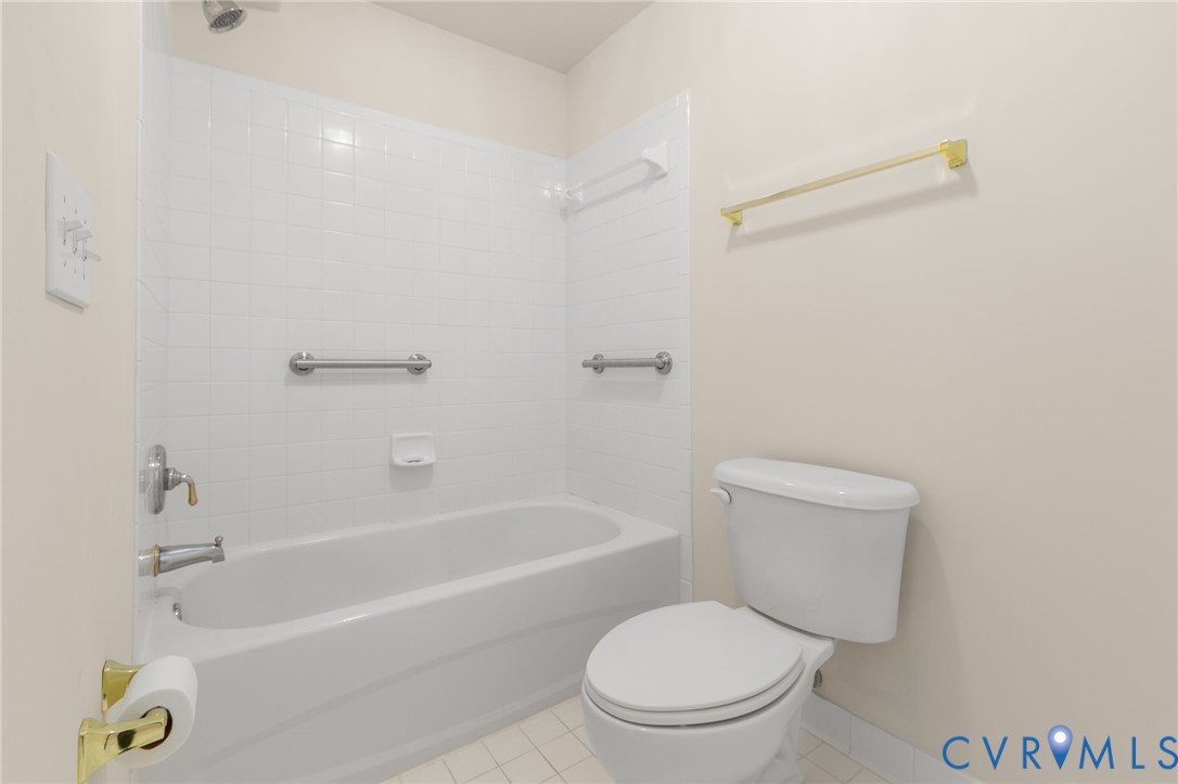 175 Shellfield Lane Colonial Beach, VA 22443 - Photo 68 of 100 a white toilet and tub sitting next to a bathroom sink