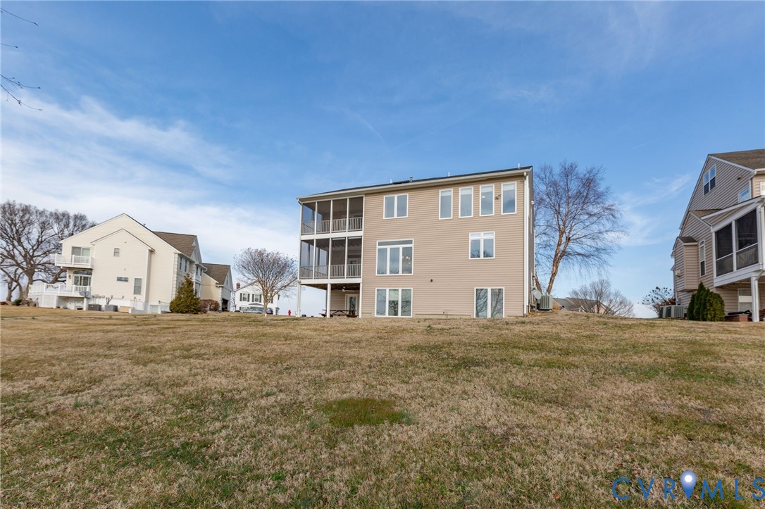 175 Shellfield Lane Colonial Beach, VA 22443 - Photo 87 of 100 Back of house with a yard