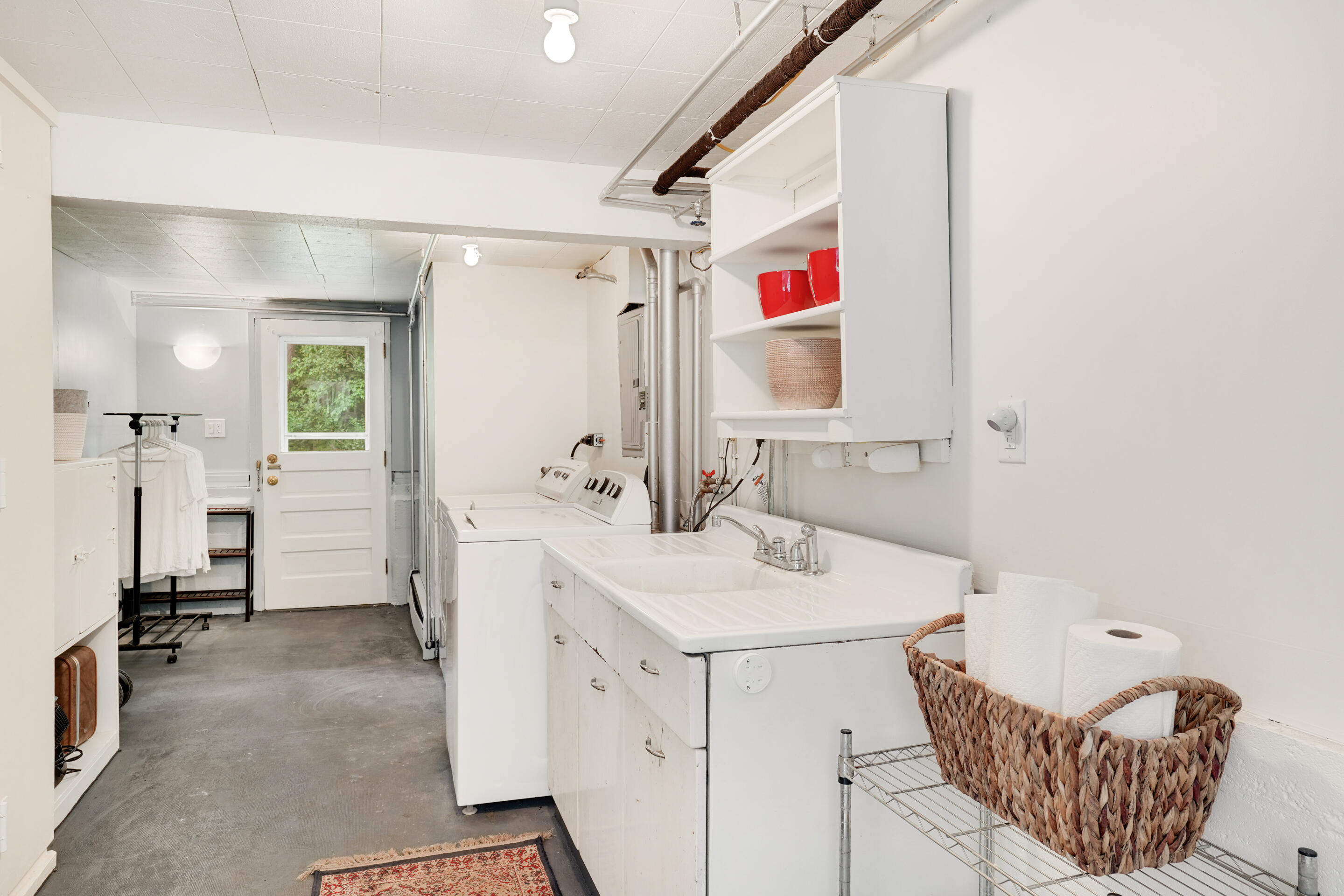 101 Juniper Road New Canaan, CT 06840 - Photo 28 of 35 Laundry + mudroom, garage + backyard