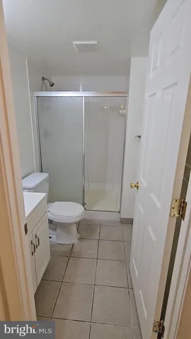 a kitchen with stainless steel appliances a sink and cabinets