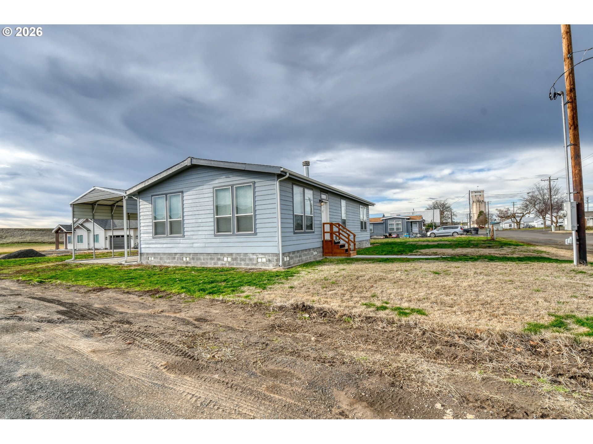 105 Columbia Street Helix, OR 97835 - Photo 2 of 34 a view of house with backyard and entertaining space