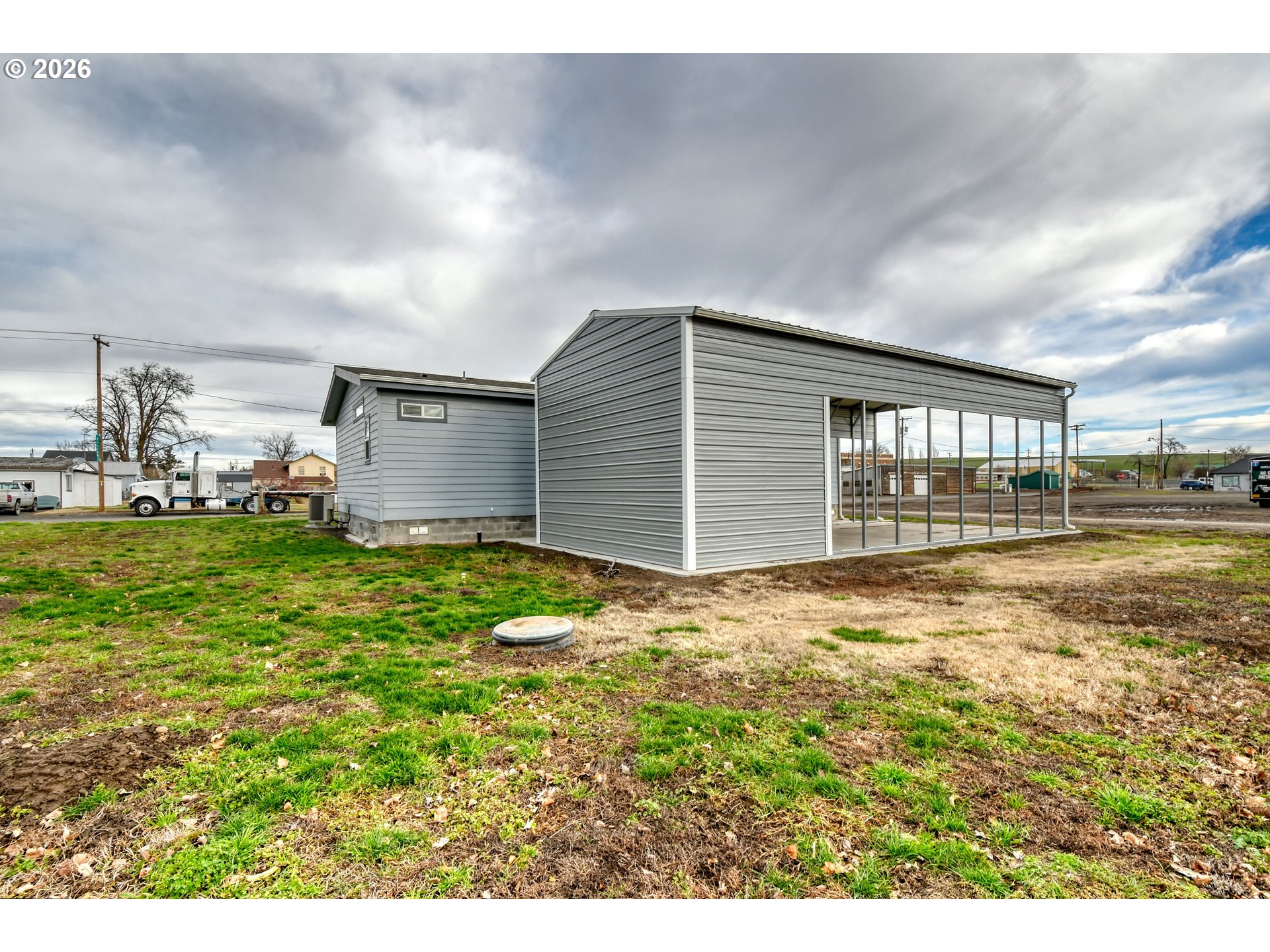 105 Columbia Street Helix, OR 97835 - Photo 31 of 34 a view of a house with a yard