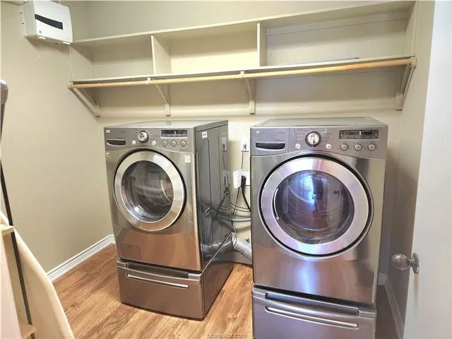 a utility room with dryer and washer
