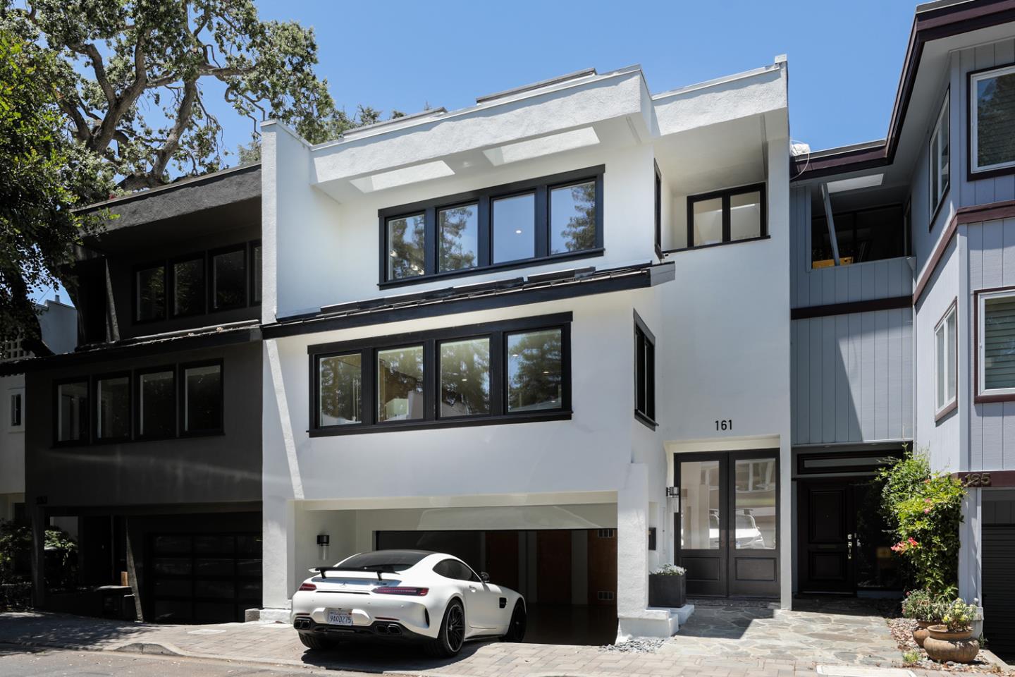 161 Stone Pine Lane Menlo Park, CA 94025 - Photo 4 of 26 a car parked in front of a building