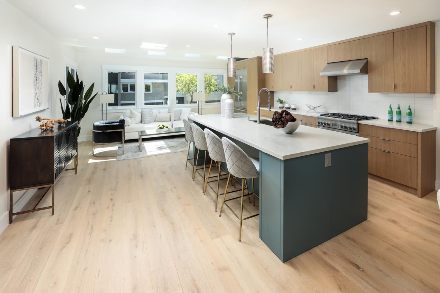 161 Stone Pine Lane Menlo Park, CA 94025 - Photo 9 of 26 a kitchen with kitchen island a counter top space a sink stove and cabinets