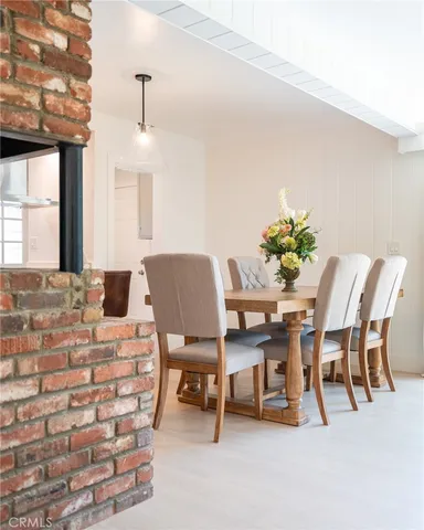 a view of living room with furniture and a window