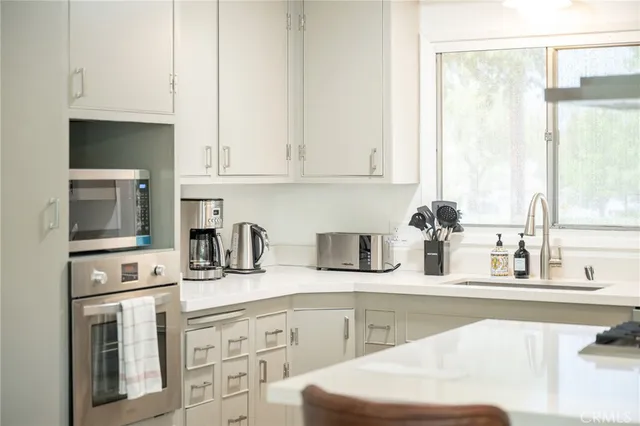 a bedroom with a bed and a night stand