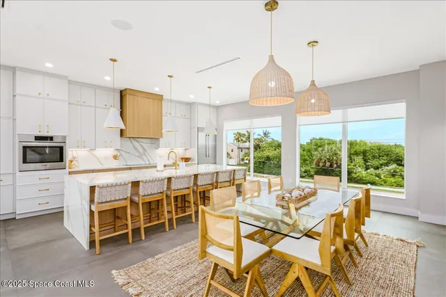 a spacious bathroom with a granite countertop sink a large mirror and a shower