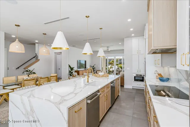 a view of a swimming pool and lounge chairs