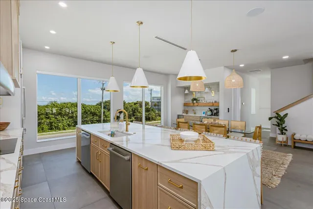 a bathroom with a sink a toilet and a shower curtain