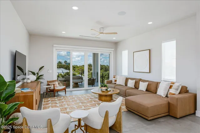 a view of a swimming pool with an outdoor seating