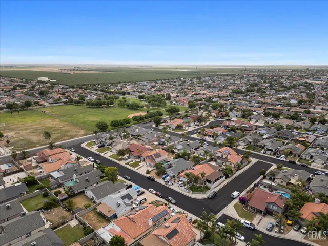 an aerial view of lake and city
