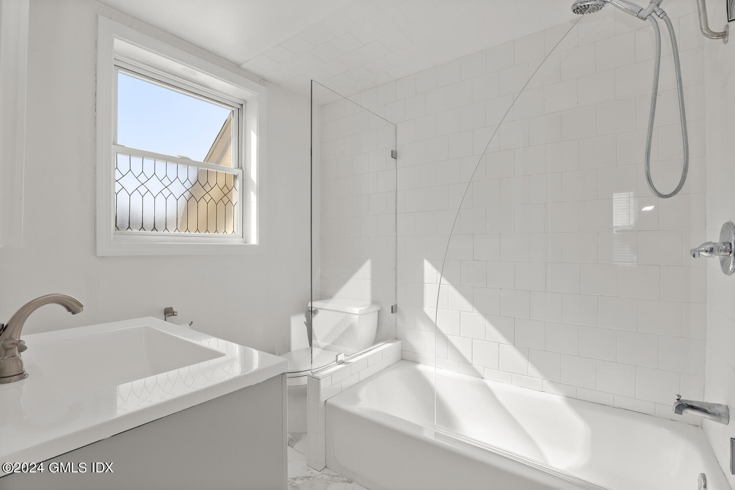 71 Old Field Point Road Greenwich, CT 06830 - Photo 11 of 23 a bathroom with a sink and a bathtub