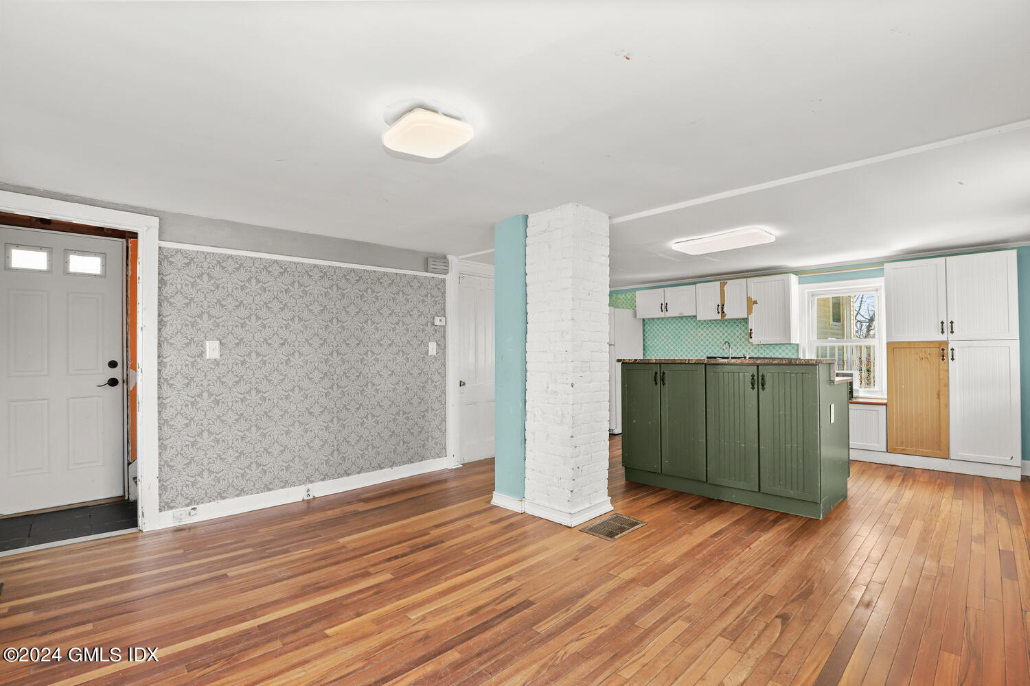 71 Old Field Point Road Greenwich, CT 06830 - Photo 12 of 23 a view interior of a house with wooden floor and windows