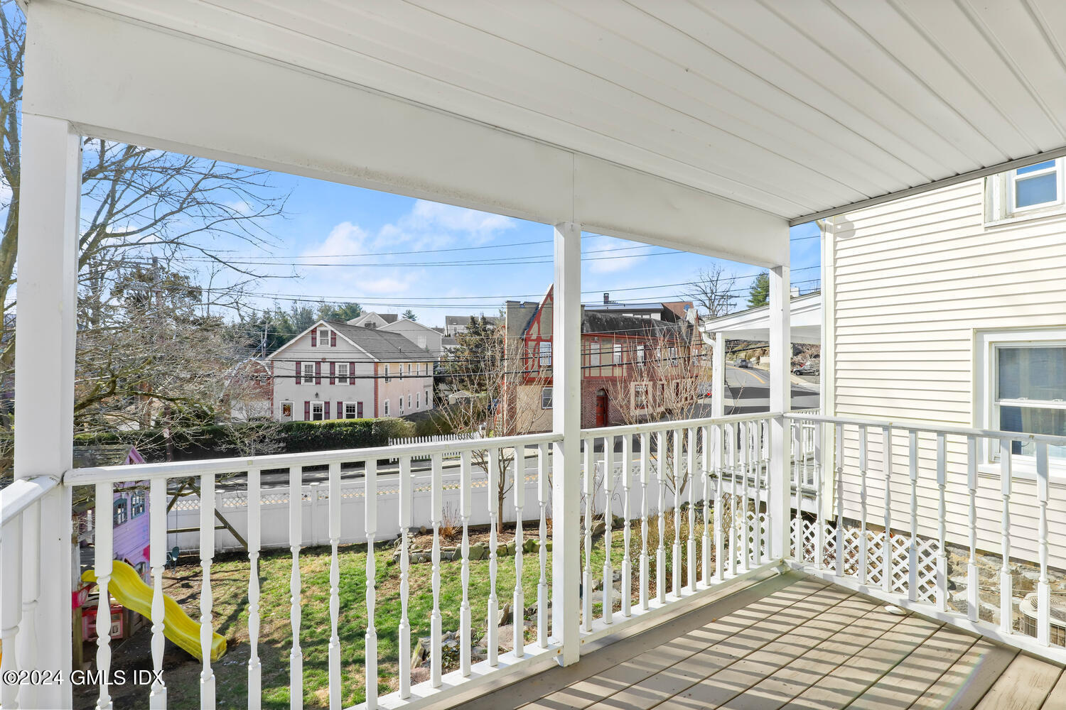 71 Old Field Point Road Greenwich, CT 06830 - Photo 8 of 23 a view of a balcony with wooden fence