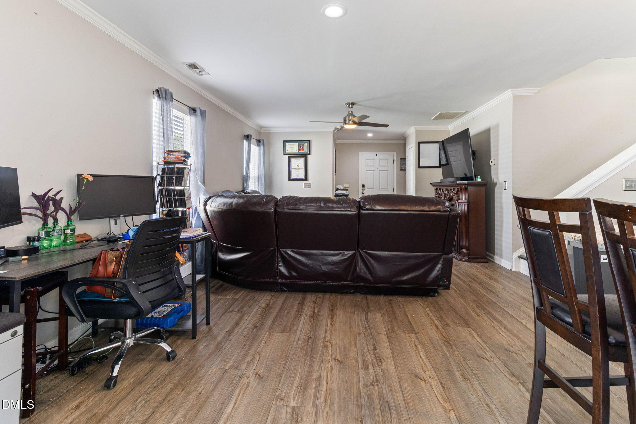3713 Marshlane Way Raleigh, NC 27610 - Photo 13 of 38 a living room with furniture and a wooden floor
