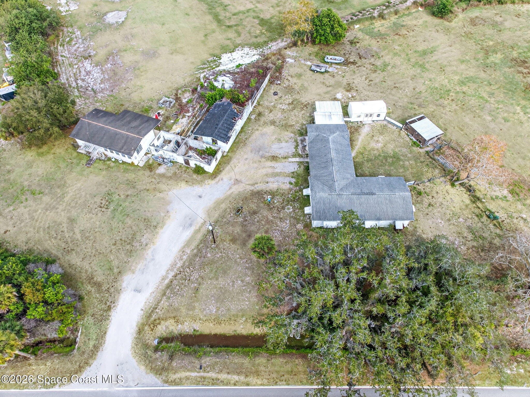 3825 Turtle Mound Road Melbourne, FL 32934 - Photo 14 of 19 a view of a yard with chairs