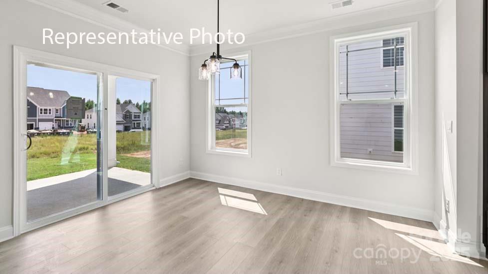 7633 Bainbridge Road Sherrills Ford, NC 28673 - Photo 11 of 34 a view of an empty room with glass door