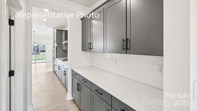 a hallway with cabinets