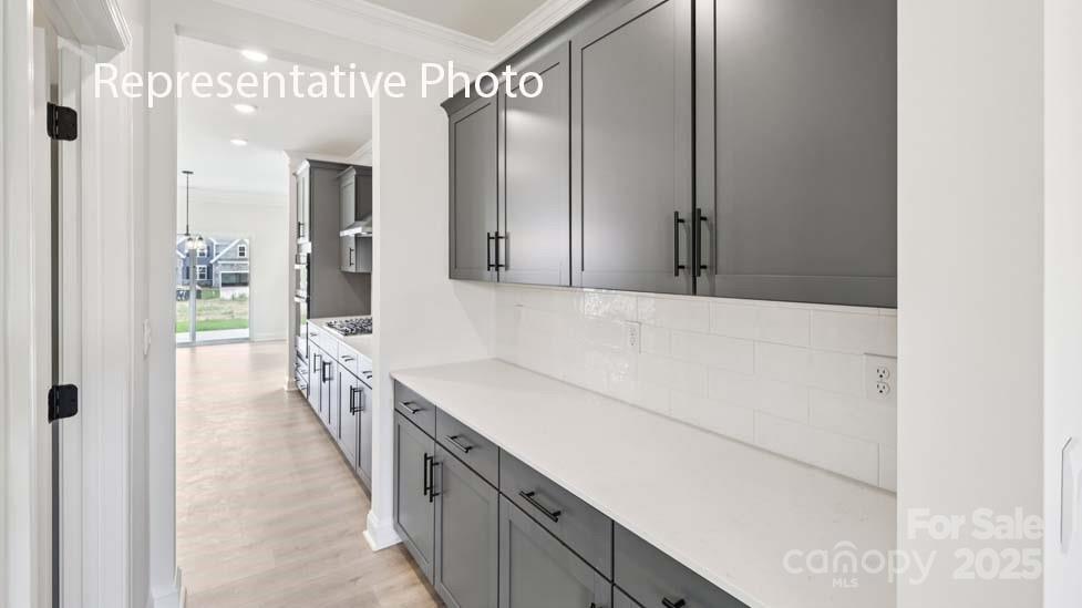 7633 Bainbridge Road Sherrills Ford, NC 28673 - Photo 13 of 34 a hallway with cabinets